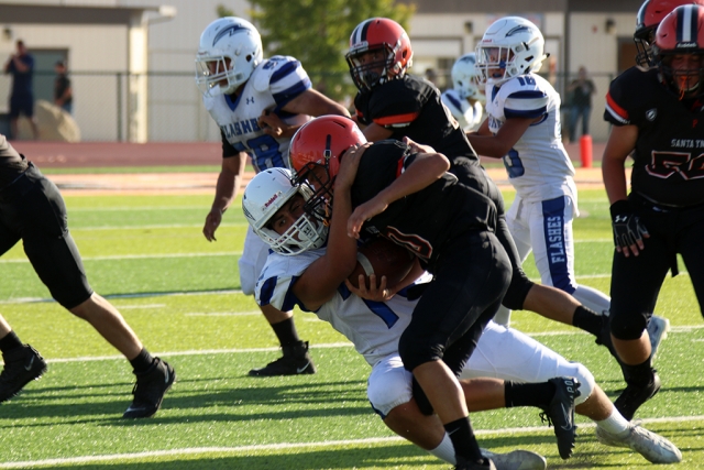 (above) Flashes JV player making the tackle that kept a Santa Ynez player from advancing. Final score not posted at this time; next game is a Thursday, September 9th, at 3:30pm, San Marino. 