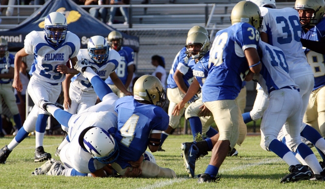 Flashes JV player brings #4 down after a few yards. On defense Jacob Perez, Johnny Wilber, Collin Farrar made the most tackles of the game against Channel Islands.