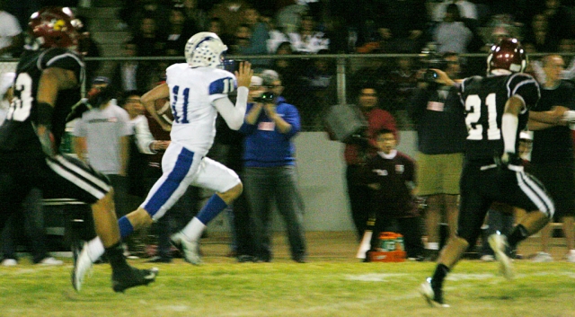 Corey Cole was 18 of 34 for 238 yards passing and two touchdown passes. Cole also had 12 carries for 86 yards and two rushing touchdowns. Football photos courtesy of Crystal Gurrolla.