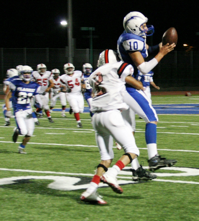 Chris De La Paz #10 catches the football on an 18 yard pass from Corey Cole which kept Fillmore’s drive going.