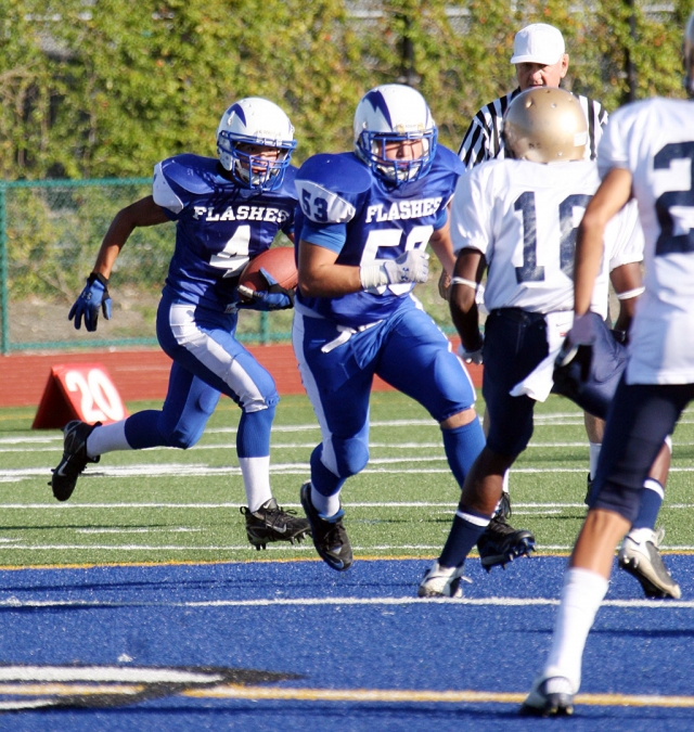 George Orozco #53 blocks for Edwin Baton #4. Fillmore beat Santa Clara 20-19.