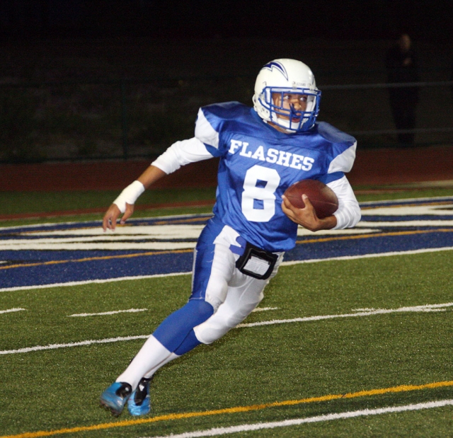 Ernesto Ballesteros #8 gained yardage for Fillmore against Nordoff.