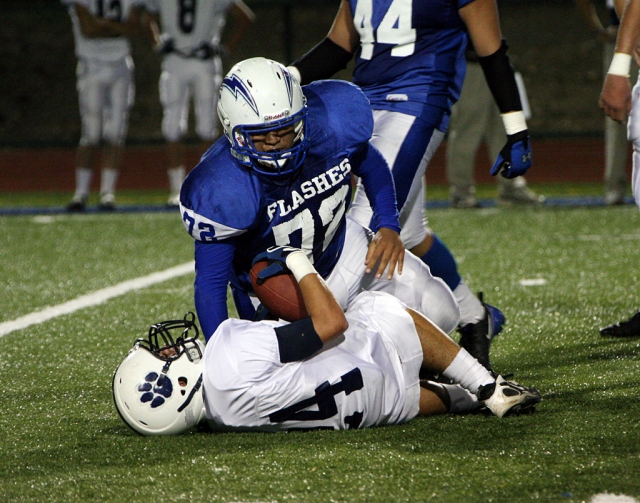 Jose Rangel #72 tackles Villanova’s runningback. The defense forced three fumbles, Derek Luna had 13 tackles and Tate Suttle had a sack.