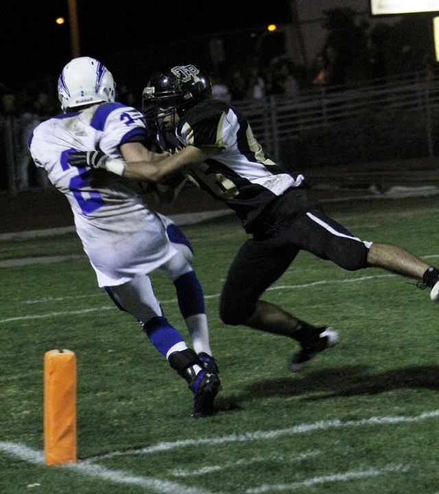 Ty Casey #2 (above) had 16 carries for 77 yards and a 38 yard touchdown. Corey Cole threw for 114 yards and Chris De La Paz had four catches for 74 yards. Fillmore beat Oak Park 13-7.