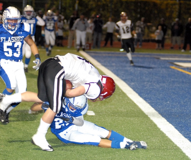 Nick Paz #21 stops Santa Paula at the line of scrimmage during Friday night’s game. Paz had 11 carries for 120 yards.