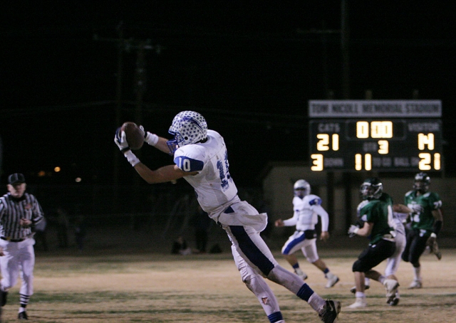 Noah Aguirre catches the ball in the air but is called out of bonds by the referee, on 4th down; there were
44 seconds left in the game. Aguirre also set a school record with 30 receptions for 521 yards.