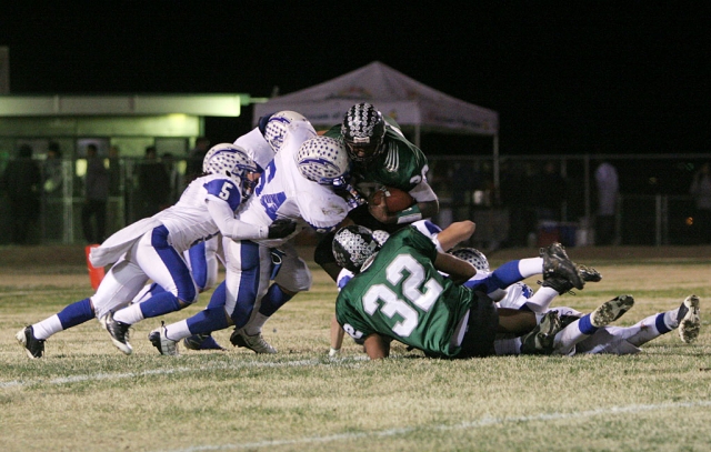 Troy Hayes #4 and Jose “Froggy” Estrada #64 worked together to bring down 29 Palms runningback. Estrada broke a school record for 62 out of 65 PAT attempts.