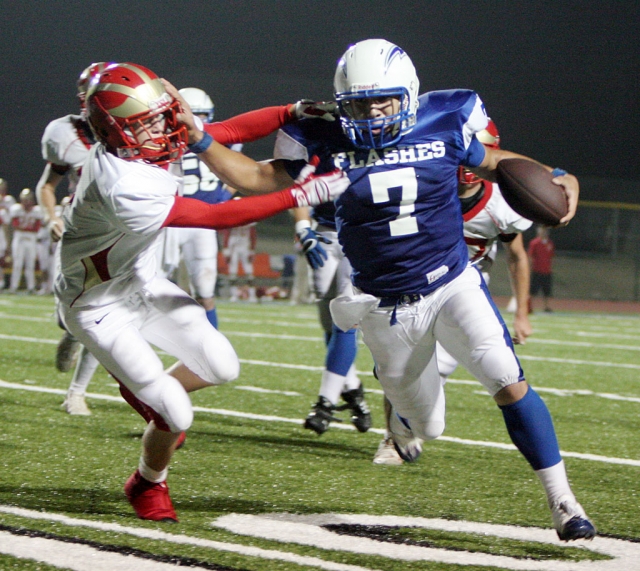 Nathan Ibarra runs into the end zone and scores another touch down against Village Christian. Fillmore beat Village Christian 41-14.