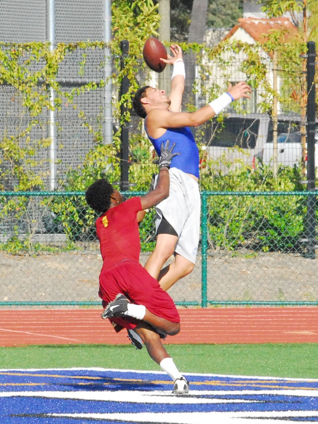 Chris De La Paz jumped for the pass but was unable to hold on to it.