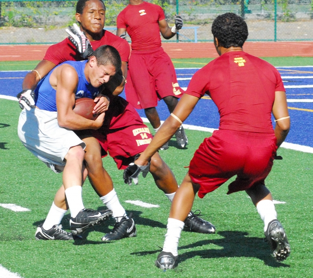 Johnny Golson holds onto the ball for a few yards.