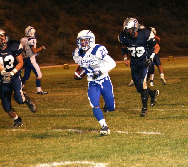 Nick Paz #21 had 8 carries for 71 yards and two touchdowns; one was a 90 yard interception return. (Photos courtesy of Crystal Gurolla)