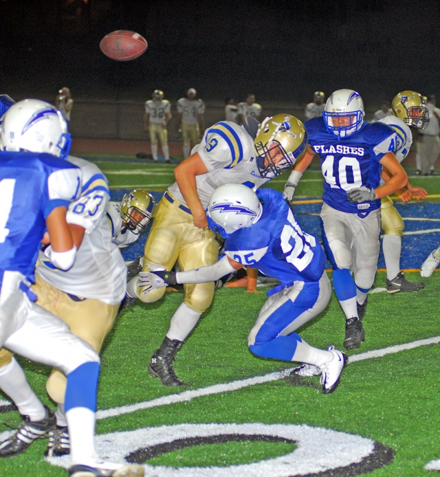 Troy Hayes had over 150 all-purpose yards and four touchdowns including a 66 yard punt return for a score, to lead the Flashes past the Channel Island Raiders. Ralph Sandoval #25, pictured above, caused a fumble in the 3rd quarter that was recovered by Marco Herrera, a key turning point in the game. Christian Prado led the defense with 11 tackles. “The team did exactly what was required of them in the second half, they didn’t allow another score and they put twenty points on the board for the go-ahead win,” stated Coach Dollar. Fillmore beat Channel Islands 27-20.