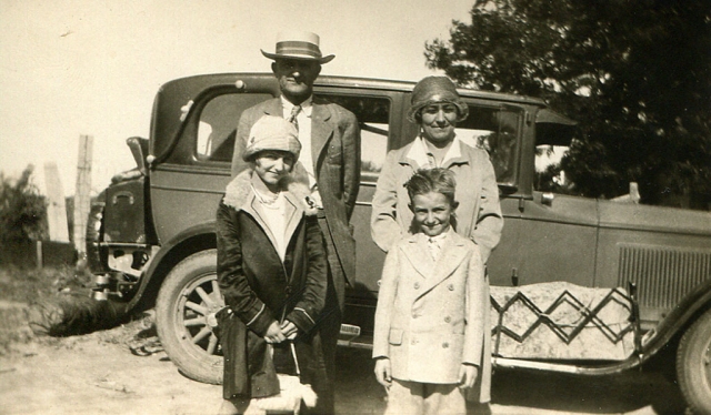 The Wagner famly on a trip back to Nebraska in 1928, the car is a 1927 Buick. Pictured are parents Charles and Anna Wagner with sister Lauda and Elton.