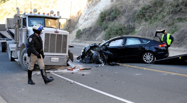 On Monday, February 3rd at 3:22pm in the 3500 block of Grimes Canyon Road / Highway 23, a tractor-trailer and black Ford Fusion collided head-on. The collision blocked both lanes and the road was reopened after 4:40pm. Minor injuries were reported. Cause of the crash is still under investigation.