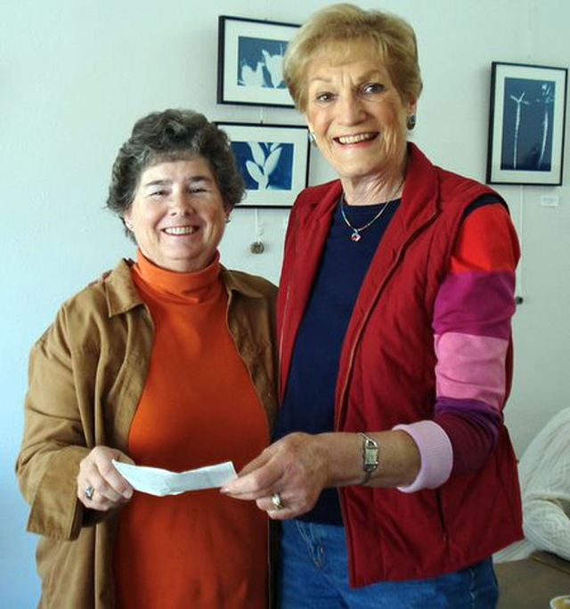 Fillmore P.E.O. Chapter GY recently donated $500 to the Fillmore Historical Society. The chapter enjoyed a tour of the facilities and wanted to show its appreciation of the efforts of those who have worked so hard to make the museum what it is today. Shown in the picture are Pat Morris, treasurer, presenting the contribution to Martha Gentry, President of the Historical Society.