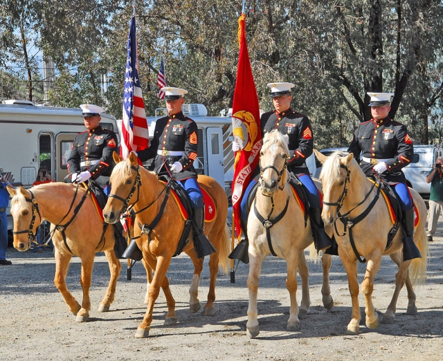 Marines troop the colors for the 1st Marine Division Association, Bodfish Chapter, Friday, during the first Campout for the organization at Britt Park in Piru. The Association presented a granite memorial, flag and flagpole, in the Division’s honor. Everyone enjoyed a great BB-Q lunch and participated in the dedication of the memorial. It is hoped that many more Campouts will take place at Britt Park.