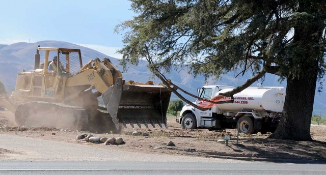 On Monday, November 13th crews were seen along Highway 126 between E and D Streets tearing down a burned out house. The house caught fire on October 23rd, along with a trailer and shed. Arson was determined, according to VC Sheriff Police Blotter.