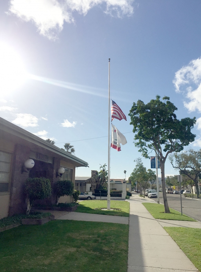 Flags outside the Fillmore Police Department are at half mass in honor of Search and Rescue Team Member Jeff Dye. Photo courtesy Katrionna Furness.