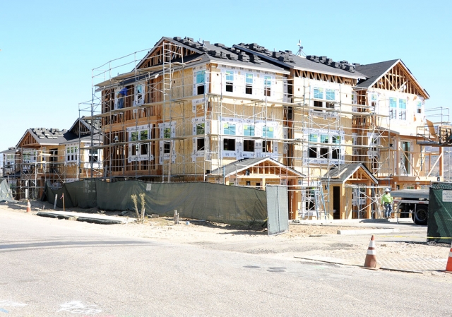 The KB Homes Citrus Grove Development located behind the Vons Shopping Center on River Street seems to be making some progress. In the past few weeks at least two 3-story condo units are nearly complete, and workers seem nearly ready to add the roofs. These are just two of the 104 units set to be built on the property, to house 375 residences.