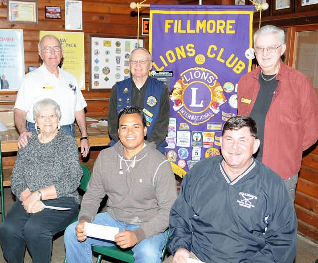 Monday, February 18th, the Fillmore Lions Club presented checks to three local organizations. Picture (back row l-r) Bill Dewey, Scott Lee, and Gerald Fitzgerald. Sitting (l-r) Raelene Chaney (Grad Nite Live), Mario Robledo (Fillmore Girls Softball), and R.J. Stump (Fillmore Little League). A total of $1500 was donated