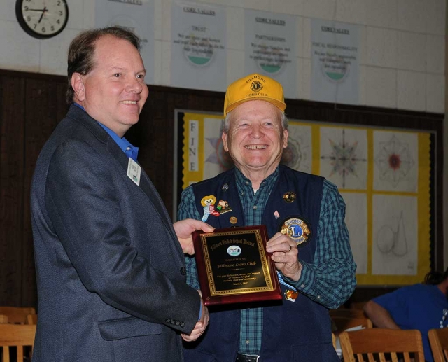 Scott Beylik presenting recognition award to Fillmore Lion’s Club member Scott Lee, thanking the Lion’s Club for their years of dedication to Fillmore Unified School District.