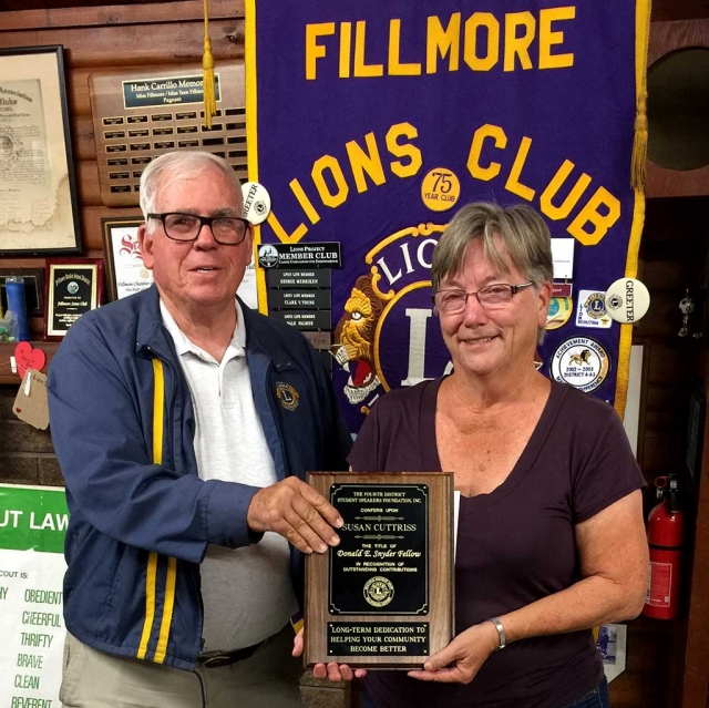 Susan Cuttriss has been awarded a Donald E. Snyder Fellowship in the Lions Fourth District Student Speakers Foundation, Inc. The award was presented by the Fillmore Lions Club. The contribution for the Fellowship will assist the Foundation in providing the $103,500 dollars in scholarships for the 2017-18 contest year and for future contest winners who are involved in the Lions Multiple District Four Student Speakers Contest. Cuttriss has served as a judge in the annual competition Fillmore for 10 years. Presenting the award is Fillmore Lions Speech Contest Chairman Bill Edmunds.