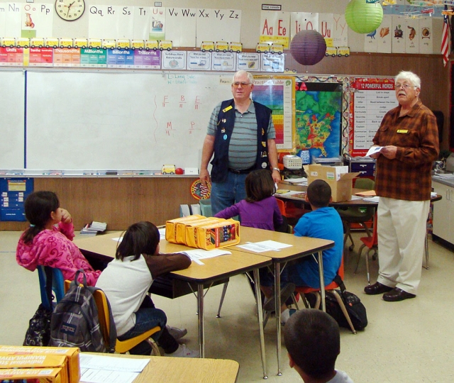 The Lions club brought flags for all third graders at San Cayetano.