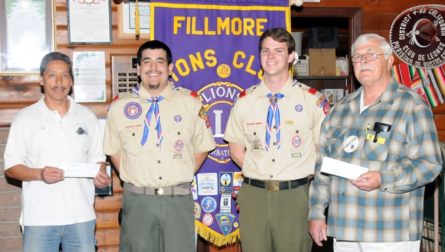 The Fillmore Lions Club presented Daniel Landeros and Brian McKeown with $100 each for achieveing Eagle Scout stature. The presentations were made by Bill Baumgartner, right, and Al Huerta, left.