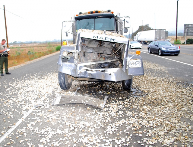 Two eastbound tractor-trailers were involved in a rear-end collision at Hwy. 126 and E Street.