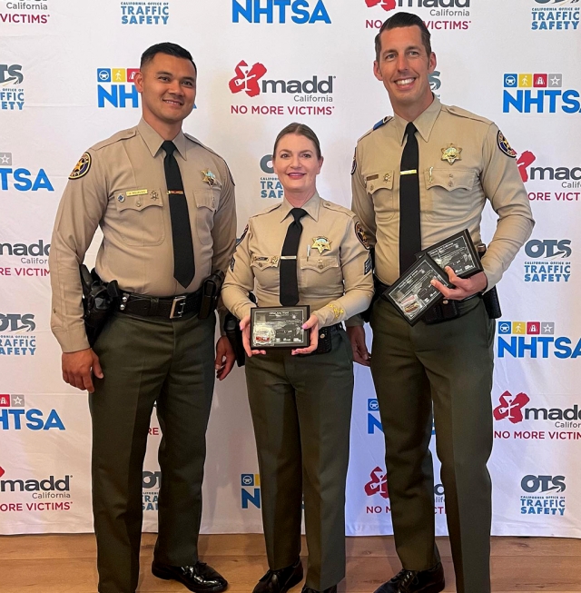 Pictured (l-r) Fillmore Station Deputy Jordan Rojalesn, Thousand Oaks Station Sr. Deputy Amy Ward and Moorpark Station Deputy Tyler Galloway received awards from MADD (Mothers Against Drunk Driving) for their efforts in DUI enforcement in 2021 at the MADD Law Enforcement Recognition Awards. Ojai Deputies Keleigh McKaig Marquez, Christian LaSecla, Headquarters Deputy Oscar Bautista, Camarillo Deputy Matthew Koenig and Moorpark Deputy Daniel James were also recognized but unable to attend. In 2021, VCSO made 793 DUI arrests to protect our communities from DUI drivers. Photo Courtesy https://www.facebook.com/VenturaCountySheriff.