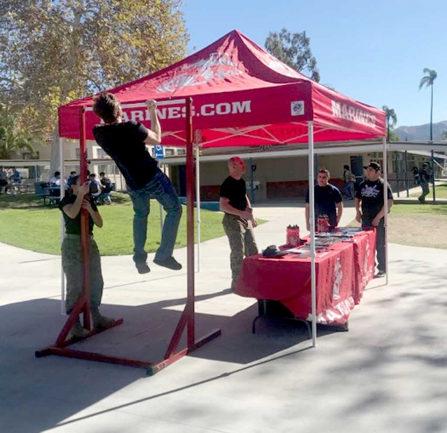 Last week during lunch at Fillmore High School the US Marine Corps set up a Pull Up Challenge for the students to compete as well as learn about the Marines. Photo courtesy Katrionna Furness.