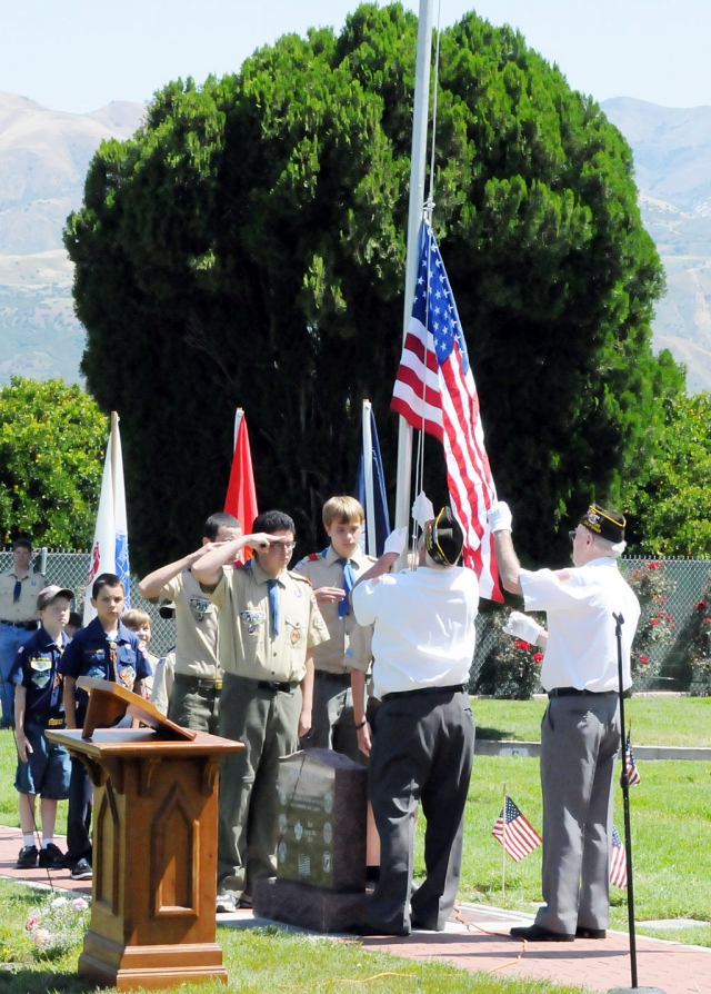 Fillmore Boy Scout Troop 406 salutes the raising of the American Flag at the Bardsdale Cemetery last Monday, Memorial Day.