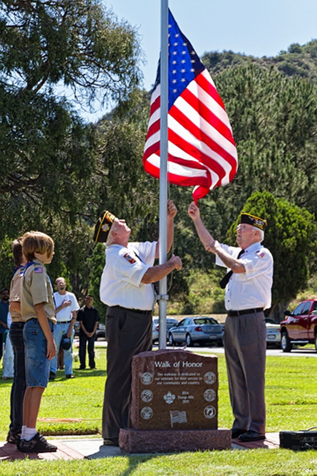Veterans of Foreign Wars, Fillmore Post 9637, raise the American flag. Photos Courtesy Bob Crum