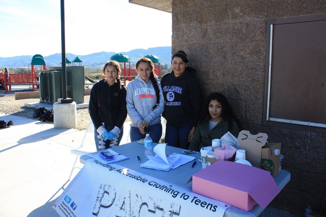 Martin Luther King Day wqas celebrated in Filllmore with a Day of Service Park Clean Up. PACT (Providing Accessible Clothing To Teens) is pictured above, taking clothing donations for youth under the age of 18 years based in Fillmore. The project was started by a group of Fillmore High School youth who wanted to give back to their community. Dozens of volunteers worked to clean-up Two Rivers Park.