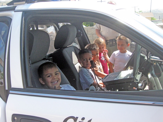 It doesn’t get more exciting than this, sitting in a real police car! Kindergartners at Mountain Vista were pretty happy last week when the Fillmore Police Department visit on Community Workers Day.