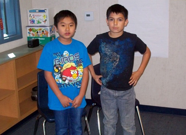 (l-r) Quan Nguyen, Spelling Bee Runner-Up and Fred Ponce, Spelling Bee Champ