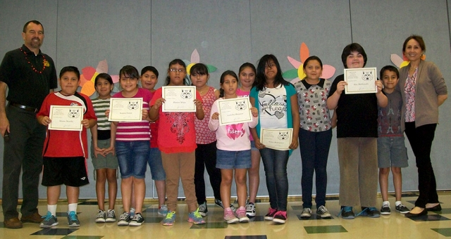 Mountain Vista honored 2nd - 5th grade Writers and Readers of the Month for the month of January at a lunchtime ceremony on February 13th. Board Member Virginia De La Piedra assisted Principal John Wilber with passing out the awards. Above, 4th and 5th Grader Writers and Readers of the Month—Principal Wilber, Alonso Murillo, Ana Karen Romero, Lupita Guiza, Alex Huchin , Denise Mejia, Gabriela Gomez, Isabella Minjares,
Analise Luna, Dulce Rodriguez, Kimberly Lizarraga, Max Maldonado, Leo Ramirez, and Board Member Virginia De La Piedra.