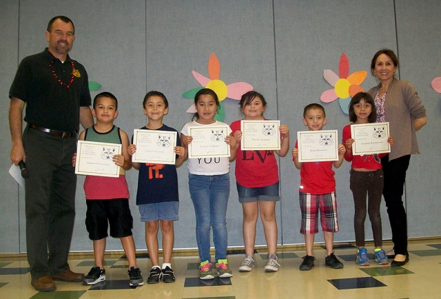 2nd Grade Writers and Readers of the month — Principal Wilber, Jachob Hernandez, Adrian Fuentes, Yuricsi Gallegos, Nayely Guzman, Ethan Ramirez, Jazmine Enamorado, and Board Member Virginia De La Piedra.