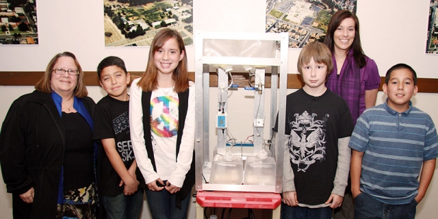 Pictured (l-r) San Cayetano Principal Jan Marholin, Alex Turcios, Kayla Garcia, Joe Cronin, Ms. Melanie Chisholm, and Joe Giunta. The students presented a NASA experiment at Tuesday night’s School Board meeting. Photo by Harold Cronin.