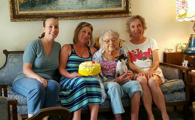 (l-r) Great Granddaughter Stacy Fontana of Moorpark CA, Granddaughter Lynda Kagel of Fillmore CA, the Birthday Girl Gertrude Ness, and Daughter Jo Ness of Montrose CA.