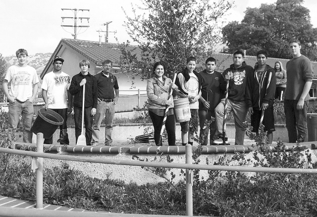Fillmore High School thanks Otto & Sons for their generous donation of an Oak tree. The Ag Biology class recently planted the tree in the middle of the quad at Fillmore High School. From left to right are Timmy Klittich, Justin Coert, Donovan Mitchell, Mr. Richter, Kassandra Quintero, Anthony Alamillo, Andres Montejano, Esneyder Gaytan, Khristian Felix, and John Reilley.