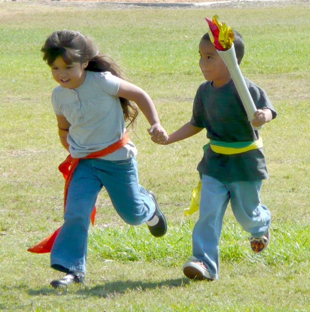 Kindergarten torch bearers, Kimberly Ruiz and Ronnie Alcozar.