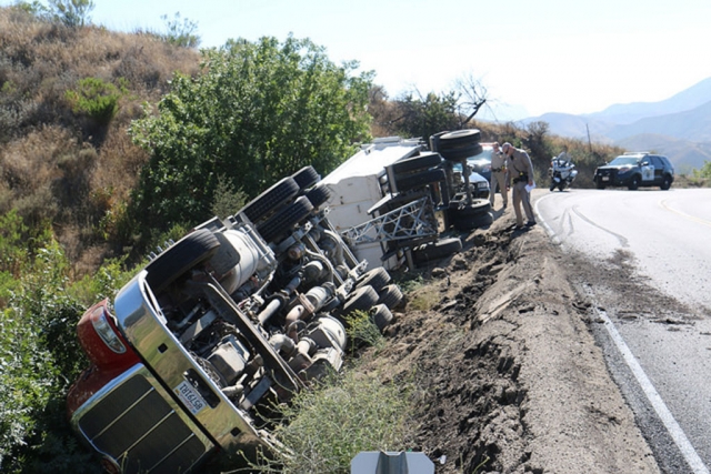 A semi-trailer truck overturned at the top of Grimes Canyon grade on Monday, June 15th at approximately 5pm. No information on the driver was available at press. Photo courtesy Sebastian Ramirez.