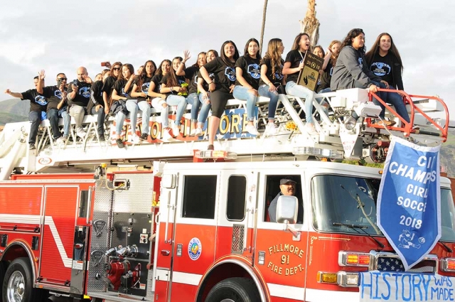 On Friday, April 6th The Fillmore Athletic Booster’s Club hosted a Victory Parade to honor the Fillmore High School Girls Soccer Team for winning their first CIF Championship Title in program history. The team also honored the very first FHS Girls Soccer Team by having them ride along in the parade with them. After the parade the community enjoyed gourmet food trucks, vendors, autographs for children, a DJ, and more.