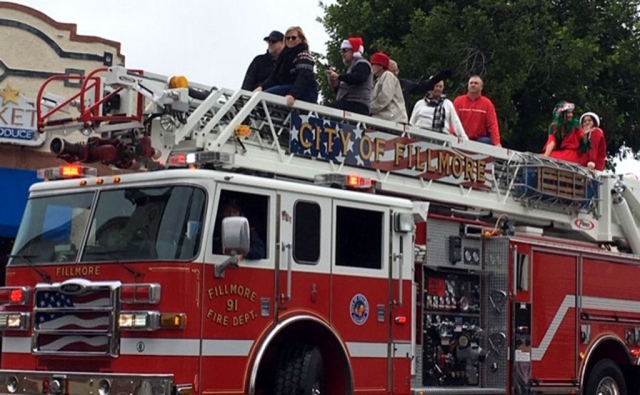 Also, riding on the Fillmore Fire Engine 91 in this year’s Lions Club Christmas Parade are Fillmore City Council members showing their Christmas spirit. Photo courtesy Jan Lee. 