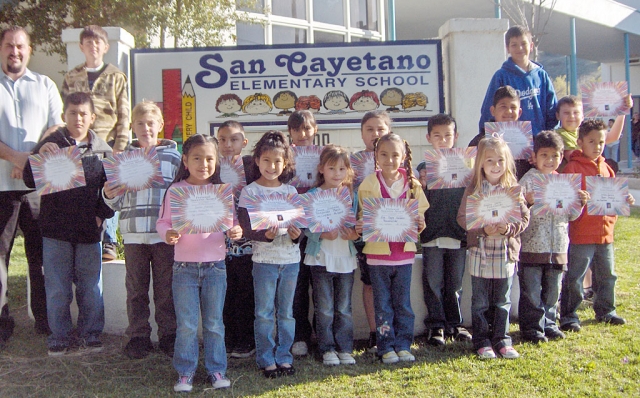 March’s San Cayetano Peacebuilders are shown with Fillmore Middle School principal Todd Schieferle.