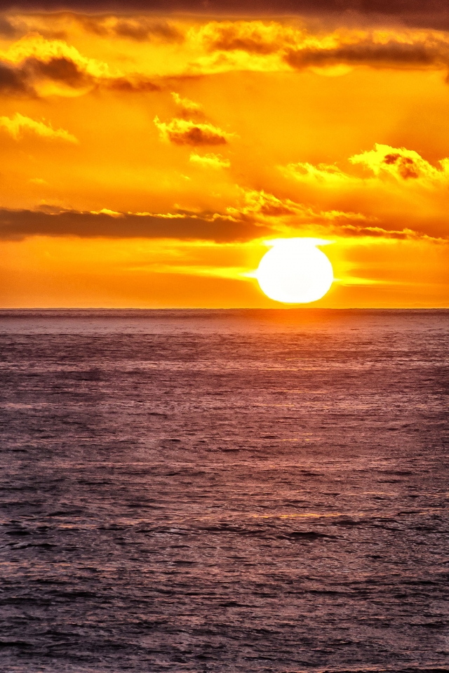 Photo of the Week: "The sun gently kissing the ocean goodnight" by Bob Crum. Photo data: Canon 7DMKII camera, manual mode, Tamron 16-300mm lens @151mm, exposure; ISO 200, aperture f/7.1, 1/160th second shutter speed.