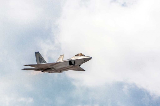 Photo of the Week "F-22 Raptor" by Bob Crum. Photo data: Canon 7DII, Manual mode, ISO 100, Tamron 18-400mm lens @400mm, f/8.0, 1/800th second shutter speed.