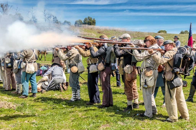 Photo of the Week "Musket Fire!" By Bob Crum. Photo data: Canon 7D Mark II camera, burst mode, Tamron 16-300mm lens @35mm, aperture f/11, shutter speed 1/640 second.