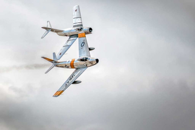 Photo of the Week "F-86F Sabre & Mikoyan-Gurevich Fagot Mig-15" By Bob Crum. Photo data: Canon 7D MKII, Manual mode, ISO 100, Tamron 18-400mm lens @355mm, aperture f/9.0, shutter speed 1/800th of a second.